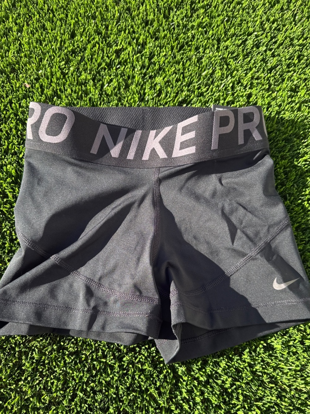 Nike Pro Black Women's Bike Shorts with Gray Logo Band